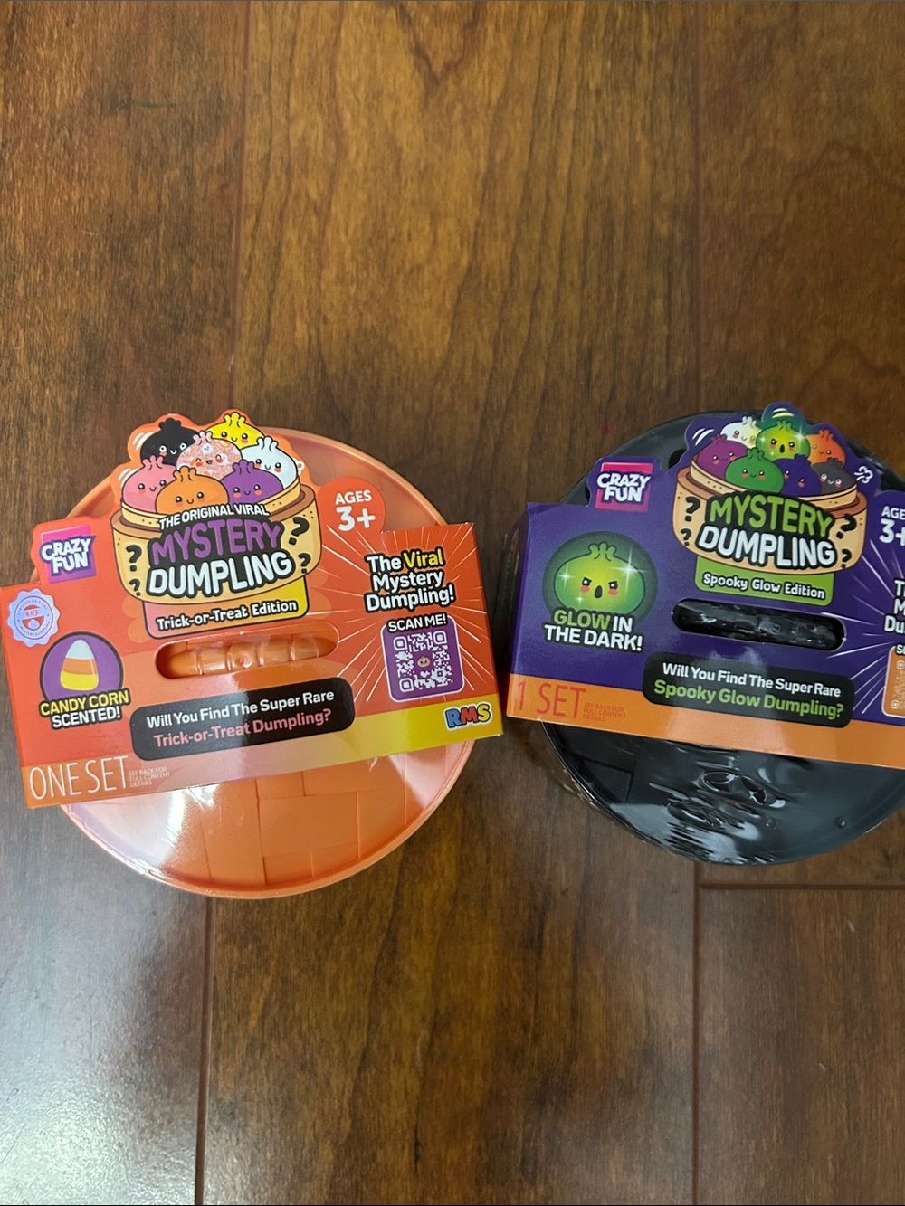 (Lot of 2). 1. Mystery Dumpling Trick-or-Treat Edition and 1 Spooky Glow Edition